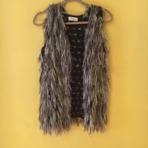 Almost new fun fur vest . Looks great with jeans .